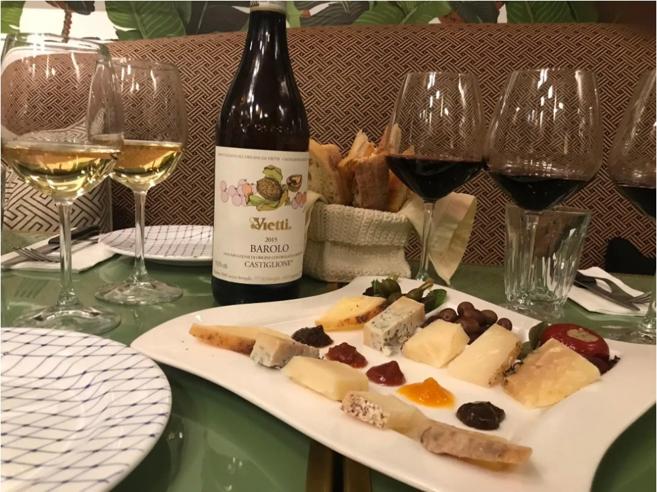 Wine and cheese tasting with red and white wines during a Florence food and wine tour at a local restaurant