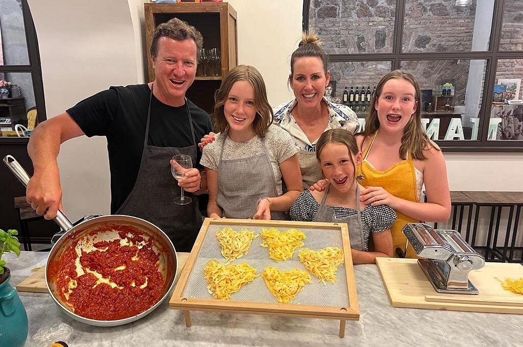 Rome food and wine tours including a family-friendly pasta-making class where participants prepare fresh homemade pasta and traditional Italian tomato sauce with a local chef.